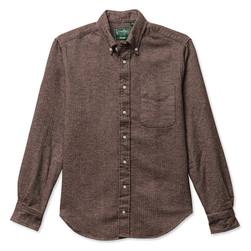 The brown herringbone button down flannel with barrel cuffs and a front pockets and white buttons.