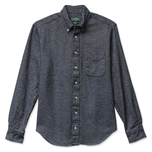 The navy herringbone button down flannel with barrel cuffs and a front pockets and white buttons.