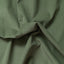 A close up of the texture of the sage corduroy fabric.