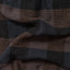 A closeup of the black waffle checkered fabric