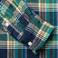 The sleeve of the navy winter madras shirt.