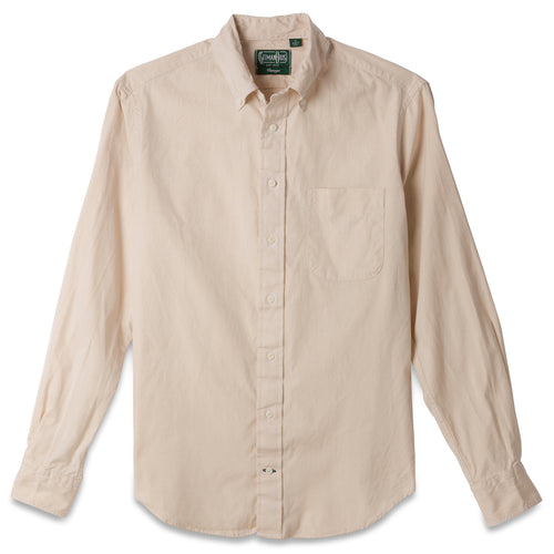 The Tan Ultralight Oxford button down shirt made from 80s single yarn cotton  with barrel cuffs, a  chest pocket, and white buttons.