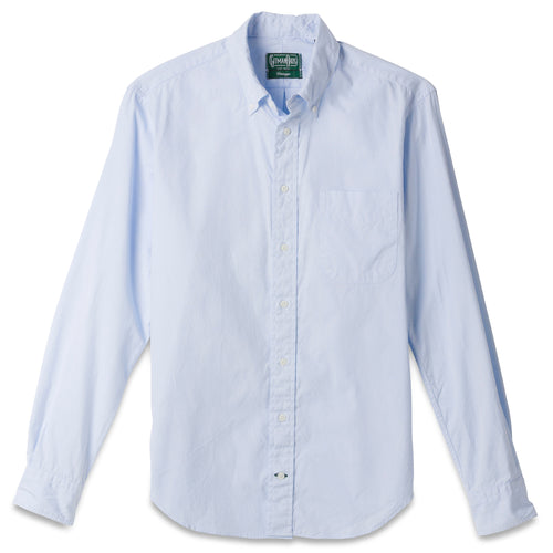 The Blue Ultralight Oxford button down shirt made from 80s single yarn cotton with barrel cuffs, a chest pocket, and white buttons.