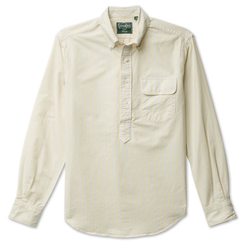 The Yellow Japanese Spring Oxford shirt made from Japanese cotton features crisp breathable fabric with barrel cuffs, a button through chest pocket, and white buttons.