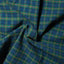 Close-up of the Blackwatch Brushed Dobby Check sport shirt's brushed dobby fabric, showcasing its soft texture and classic Blackwatch check pattern.