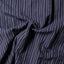 Close-up of the Navy Brushed Dobby Stripe sport shirt's brushed dobby fabric, showcasing its soft texture and subtle navy stripe pattern.