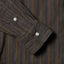 Close-up of the Brown Brushed Dobby Stripe sport shirt's lined cuff and buttons, showcasing its soft brushed dobby fabric and stripe pattern.