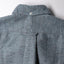 Back view of the Blue Nepped Chambray sport shirt featuring its classic shirting construction, center back pleat, and textured chambray fabric.