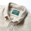 Close-up of the Ecru Nepped Chambray sport shirt's button-down collar featuring a lined collar and classic button detail.