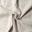 Close-up of the Ecru Nepped Chambray sport shirt's nepped chambray fabric, showcasing its distinctive texture and ecru color.