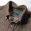 Close-up of the Brown Nepped Chambray sport shirt's button-down collar featuring a lined collar and classic button detail.