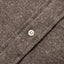 Close-up of the Brown Nepped Chambray sport shirt's button placket featuring classic buttons and textured nepped chambray fabric.