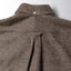 Back view of the Brown Nepped Chambray sport shirt featuring its classic shirting construction, center back pleat, and textured chambray fabric.