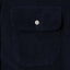 Close-up of the Navy 16-Wale Corduroy sport shirt's chest pocket, showcasing the textured cotton corduroy fabric and detailed construction.