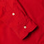 Close-up of the Red 16-Wale Corduroy sport shirt's lined cuff and buttons, showcasing its fine-wale cotton corduroy fabric.