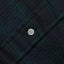 Close-up of the Blackwatch Tweed sport shirt's button placket featuring classic buttons and textured Blackwatch tweed fabric.