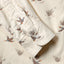 Close-up of the Ecru Waterfowl Corduroy sport shirt's lined cuff and buttons, showcasing its textured cotton corduroy fabric.