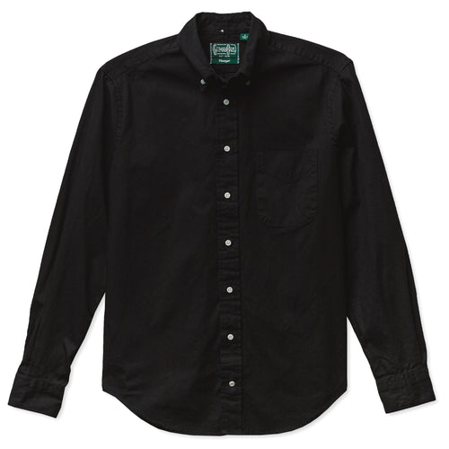 A long-sleeved, button-down black overdyed Oxford shirt with a chest pocket, flat collar, and barrel cuffs. Gitman Vintage, 100% cotton, made in the USA.